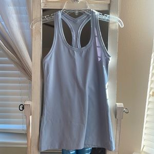 Lululemon size 6 cool racer back tank top. Color: blue linen, perfect condition
